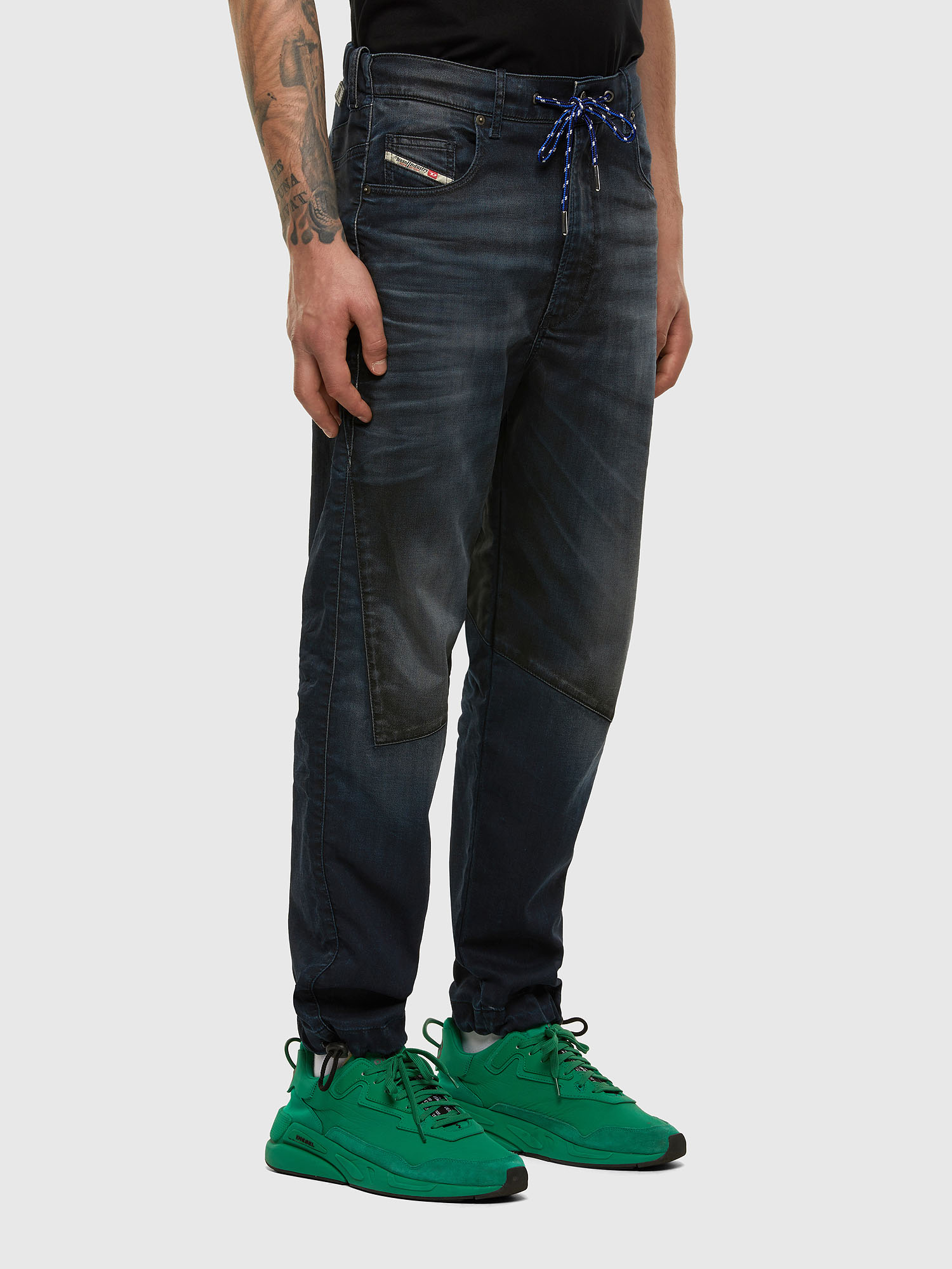 D-Skint JoggJeans 069PE Man: Tapered Dark blue Jeans | Diesel
