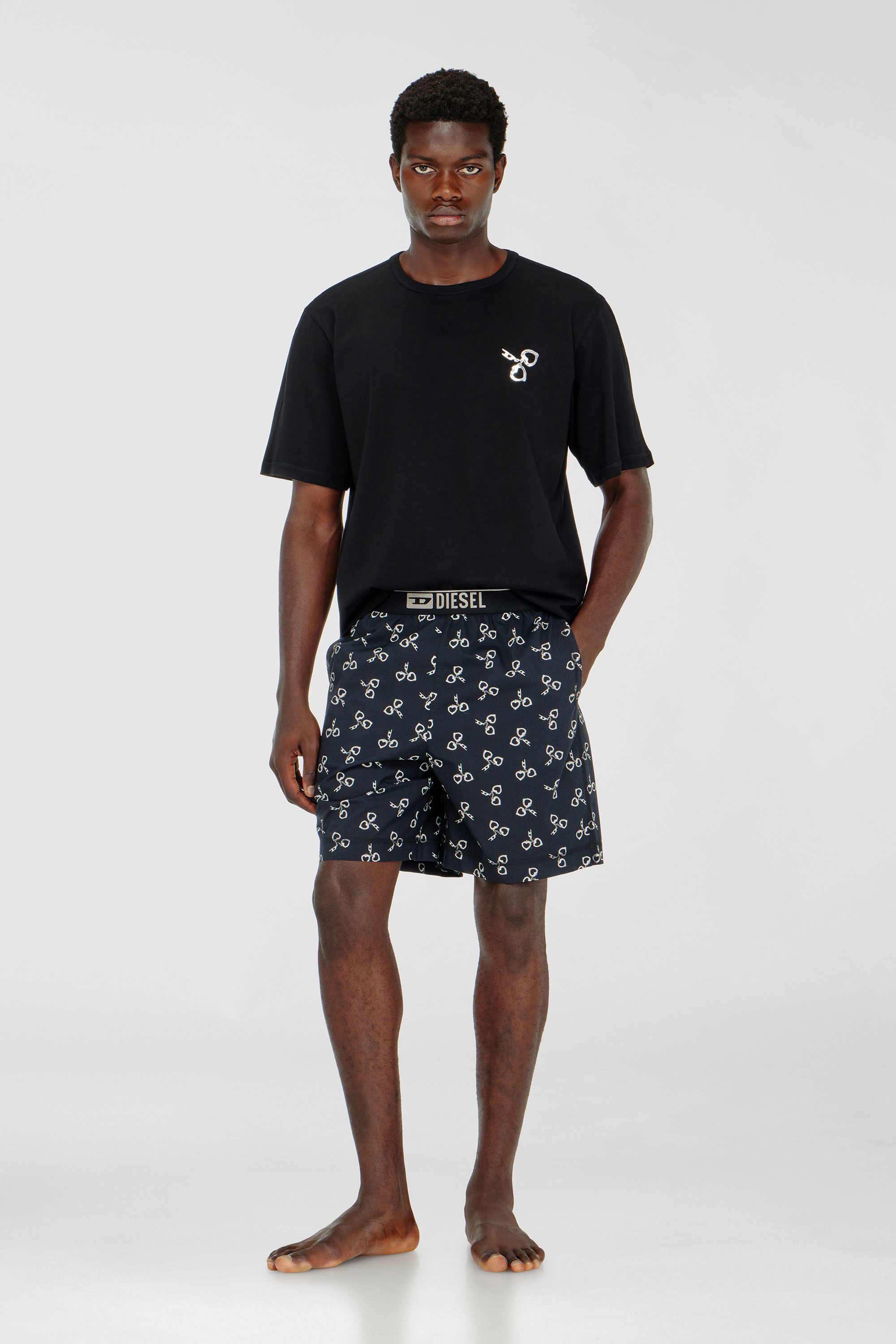Cotton pyjama set with handcuff print